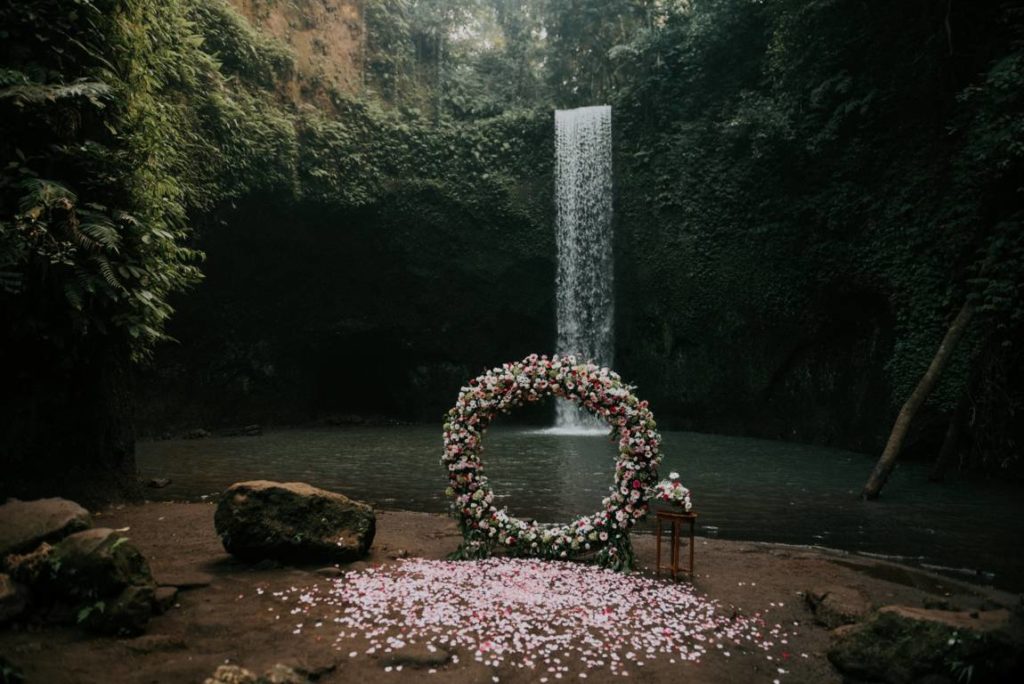 Bali waterfall wedding organized by Bali Moon Wedding
